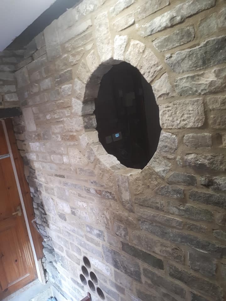 Detailed stonework with circular opening