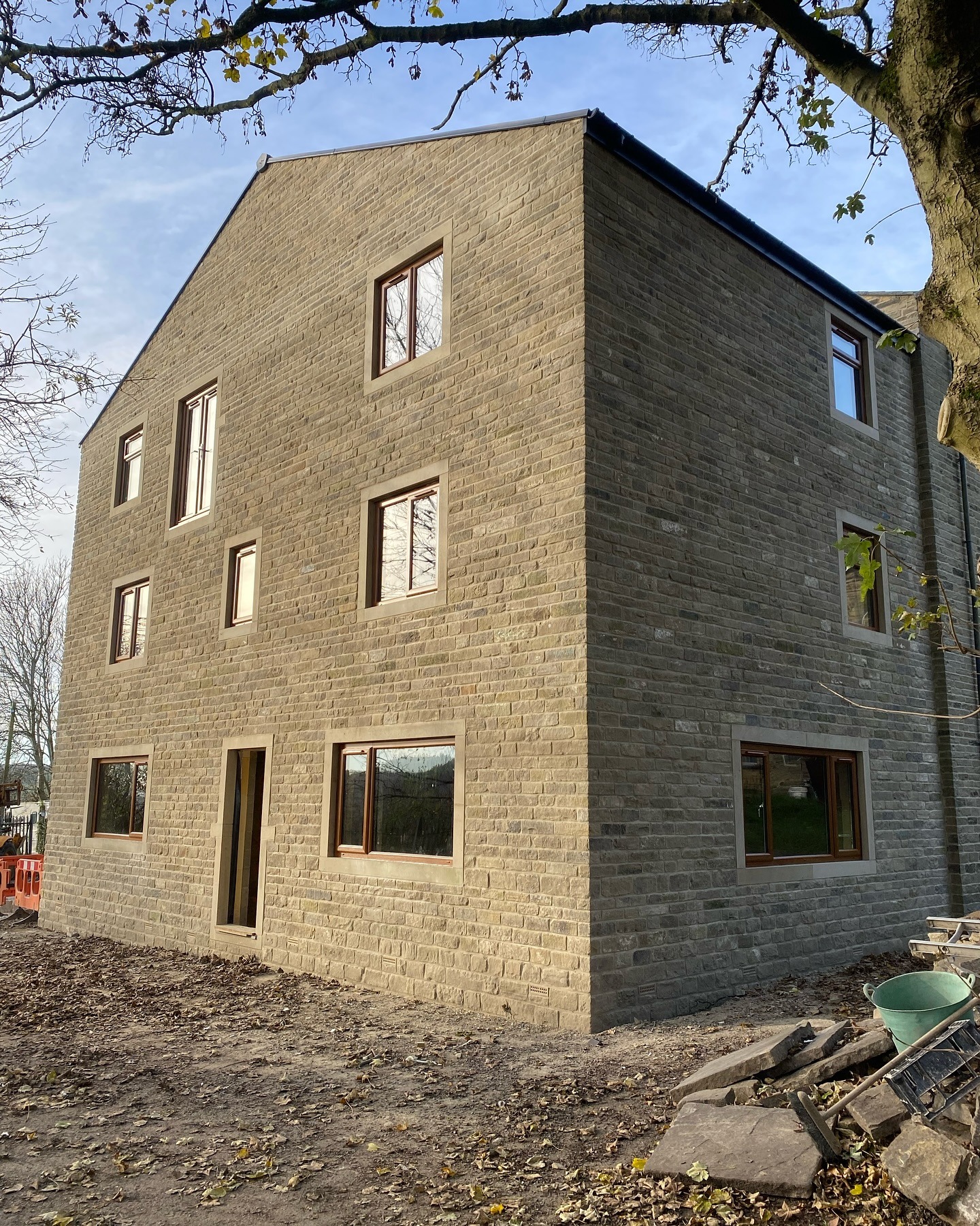 A completed stone building project by Spencer Building Services